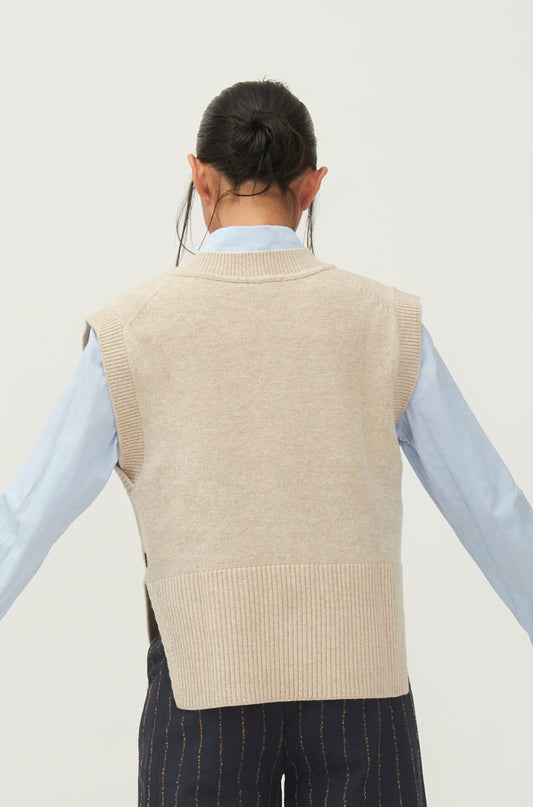 beige knitted vest
